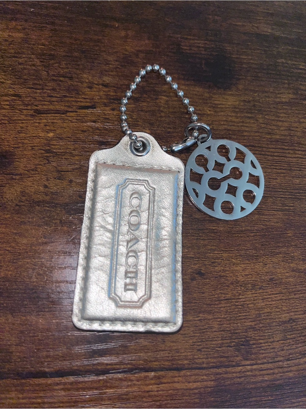 Coach Metallic Leather hangtag with Signature Charm